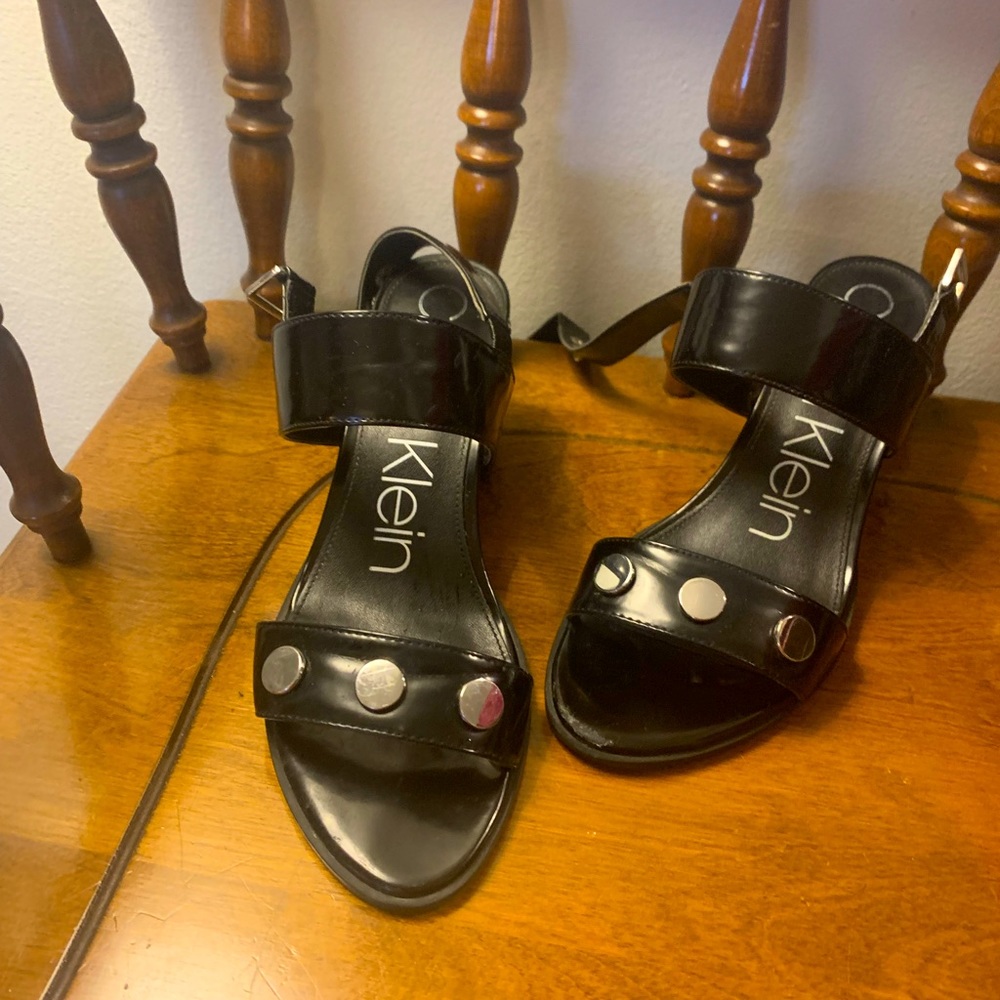Calvin Klein black sandal with silver buttons
